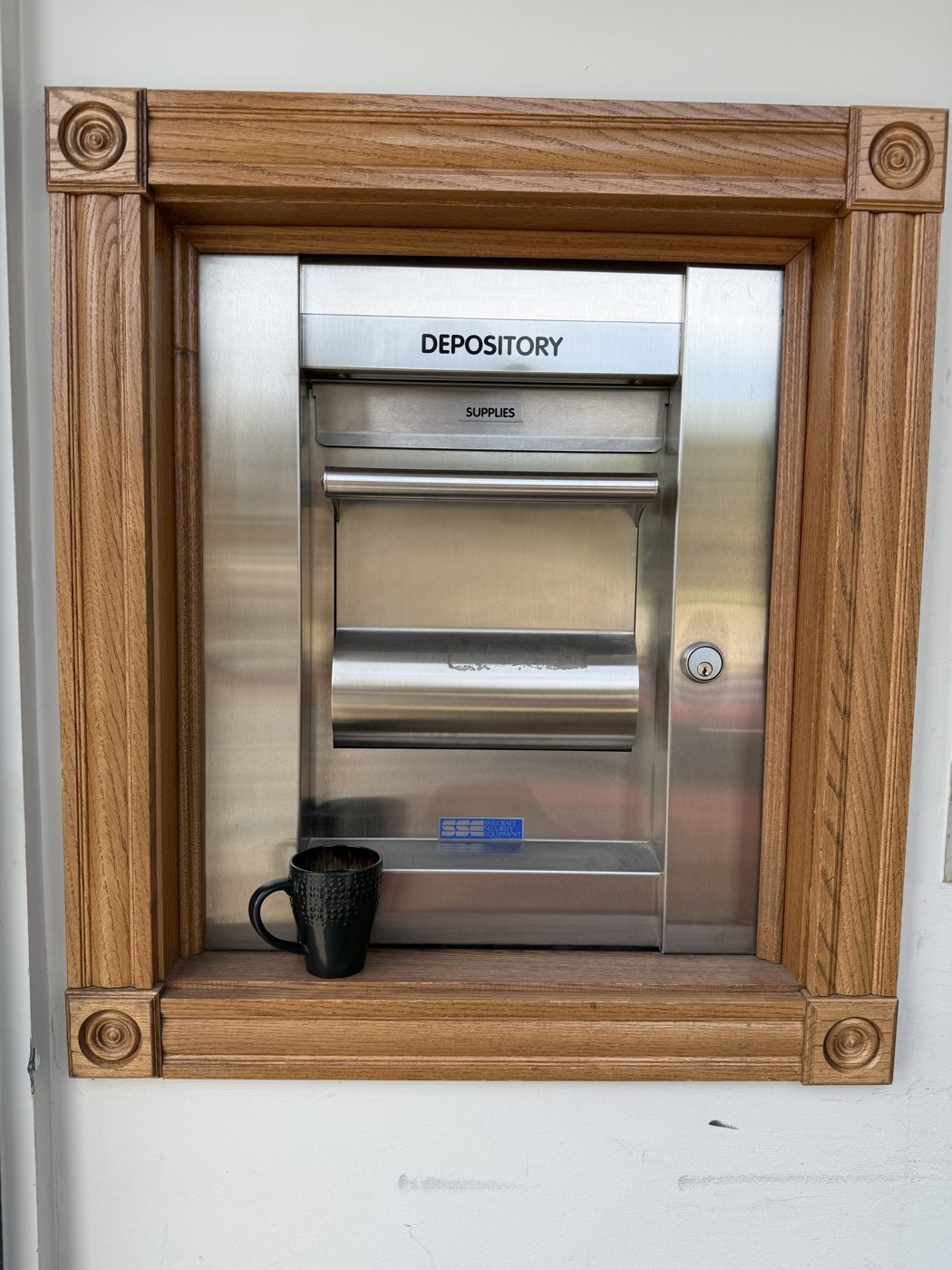 The old night depository, now holding a coffee mug